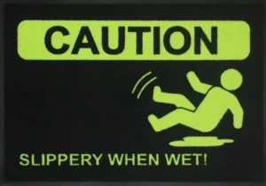 Neoonvärvi kollase tekstiga ohutusvaip tekstiga Caution