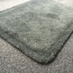 Ergonoomilise töökohamati kulumiskindla tekstiilpinna lähivaade